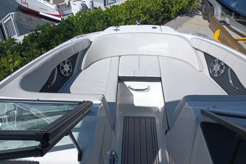 Slide: The Image of 2023 Sea Ray SPX 190 Outboard boat interior with sleek seating and modern design. - 10