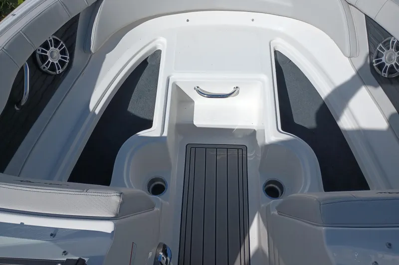 Slide: The Image of 2023 Sea Ray SPX 190 Outboard boat interior with seating and speakers. - 12