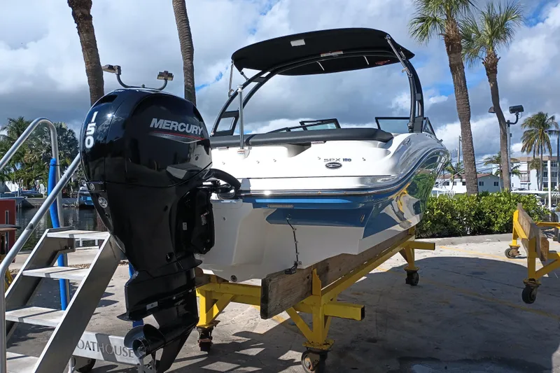 Slide: The Image of 2023 Sea Ray SPX 190 Outboard boat with Mercury engine on display. - 2