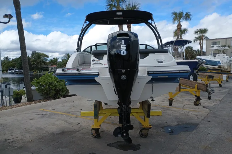 Slide: The Image of 2023 Sea Ray SPX 190 Outboard boat on display with Mercury 150 engine. - 4