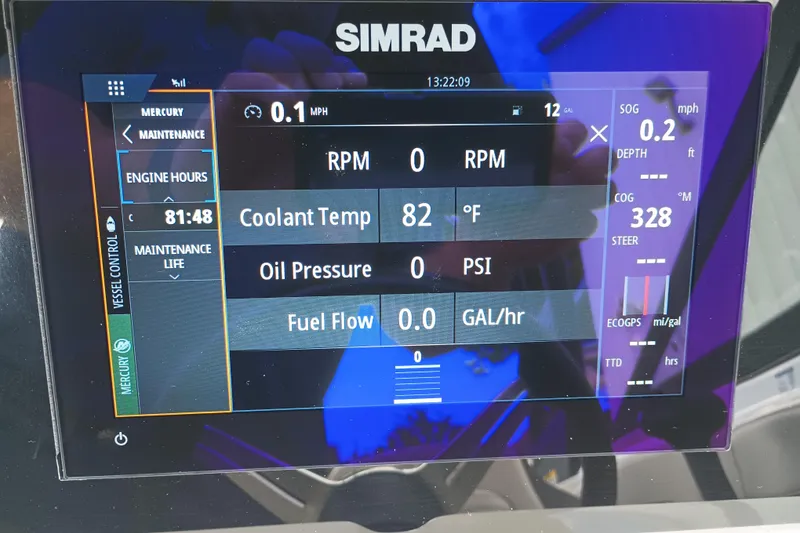 Slide: The Image of Simrad display on 2023 Sea Ray SPX 190 Outboard showing engine metrics and navigation data. - 7