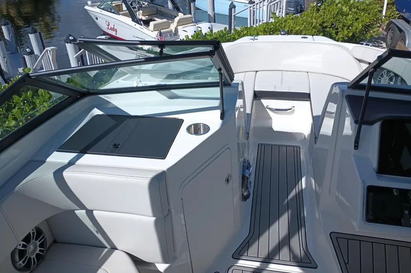 Slide: The Image of 2023 Sea Ray SPX 190 Outboard boat interior with sleek seating and modern design. - 9