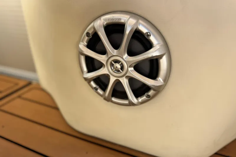 Slide: The Image of Speaker on 2013 Bennington 2575QCW I/O boat, mounted on wooden deck. - 30