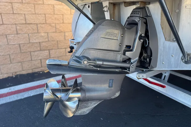 Slide: The Image of 2013 Bennington 2575QCW I/O boat with Volvo Penta outdrive, close-up view. - 7