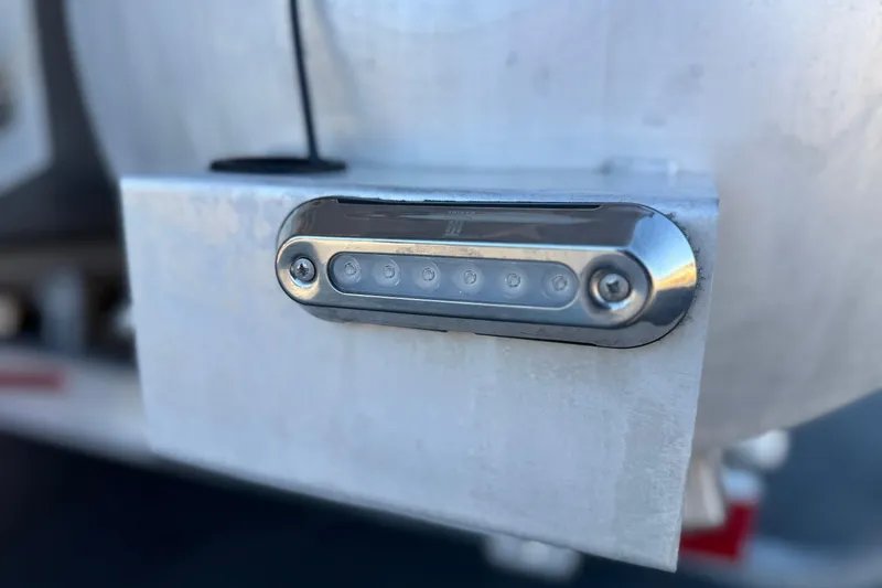 Slide: The Image of Close-up of a 2013 Bennington 2575QCW I/O boat's LED light fixture. - 8
