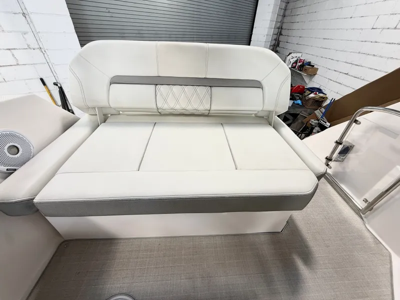 Slide: The Image of Interior of Regal 26 XO boat, white upholstery, year 2021. - 11