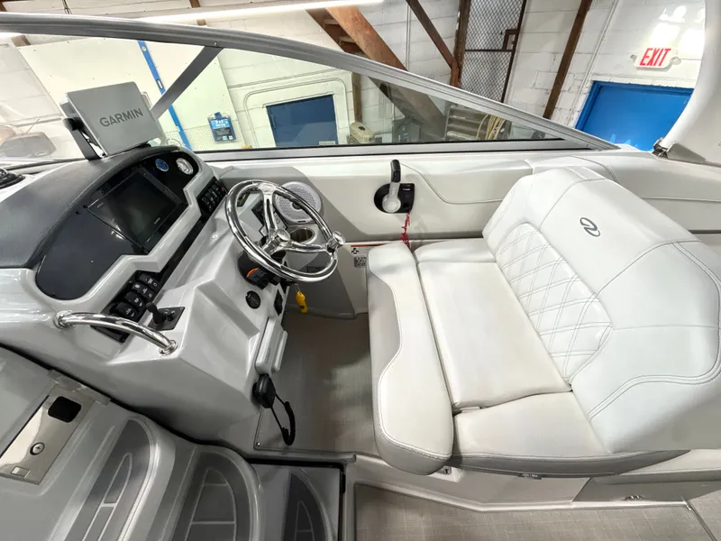 Slide: The Image of Interior of 2021 Regal 26 XO with helm and seating. - 14