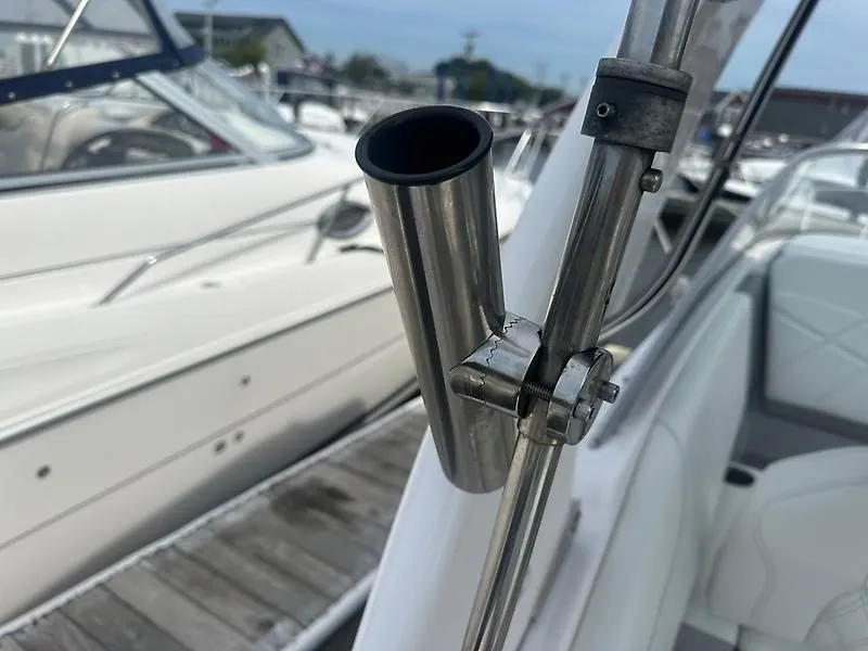 Slide: The Image of Regal 26 XO 2021 boat with stainless steel holder at dock. - 19