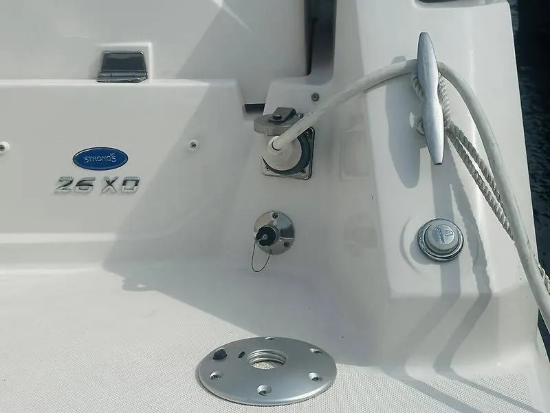 Slide: The Image of Regal 26 XO boat hull with rope and fittings, year 2021. - 21