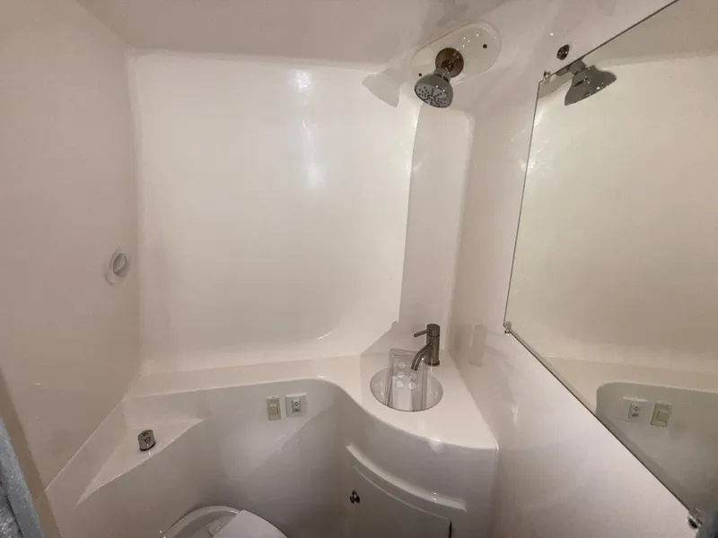 Slide: The Image of Bathroom in 2021 Regal 26 XO boat. - 28