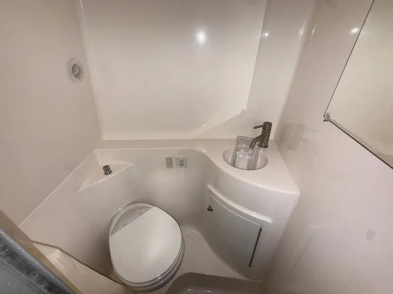 Slide: The Image of Bathroom in Regal 26 XO boat, 2021 model. - 29