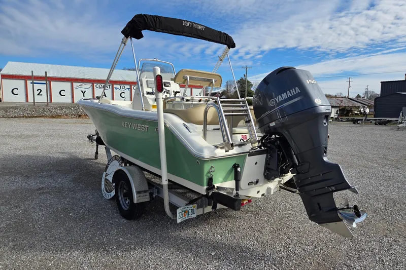 Slide: The Image of 2015 Key West 203 FS boat with Yamaha 150 engine on trailer. - 3