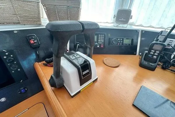 Slide: The Image of Control panel of a 2006 Lagoon 440 catamaran with navigation equipment. - 37