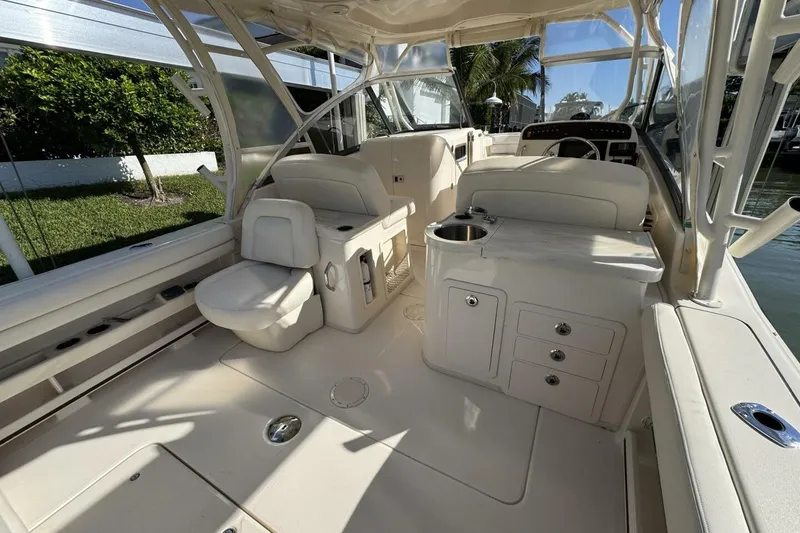 Slide: The Image of 2016 Grady-White Freedom 307 boat interior with seating and storage. - 17