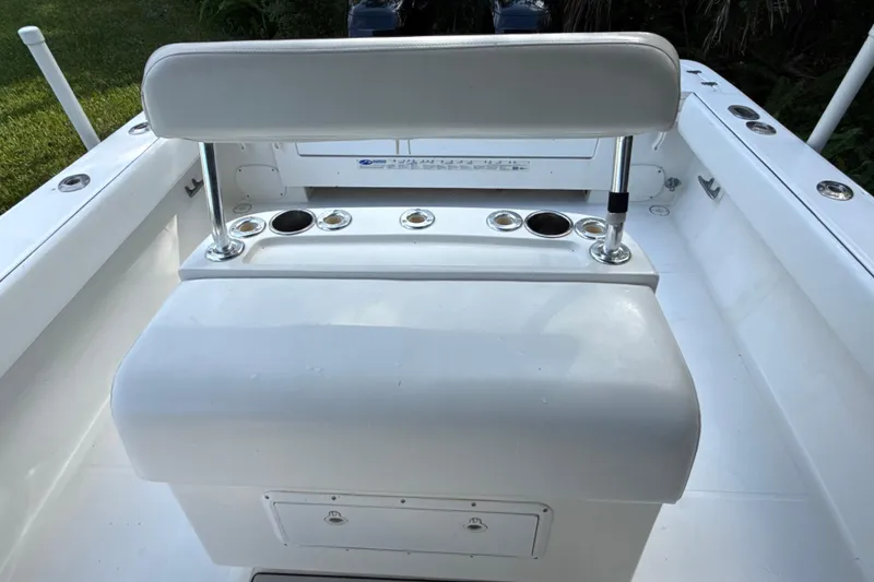 Slide: The Image of 2002 SeaCraft SC32 Master Angler boat interior with seating and rod holders. - 22