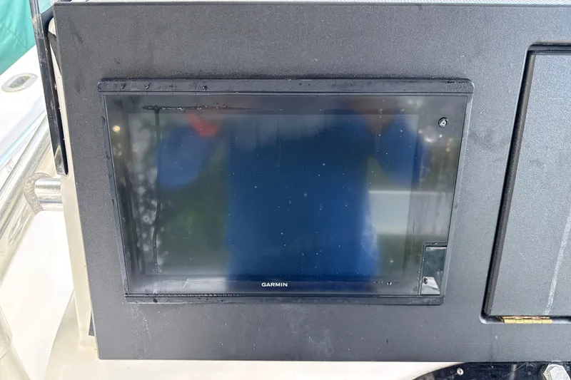 Slide: The Image of Garmin display on 2002 SeaCraft SC32 Master Angler boat dashboard. - 25