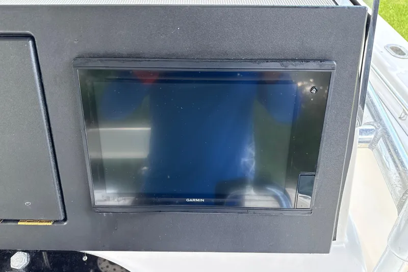 Slide: The Image of Garmin display on 2002 SeaCraft SC32 Master Angler boat dashboard. - 27