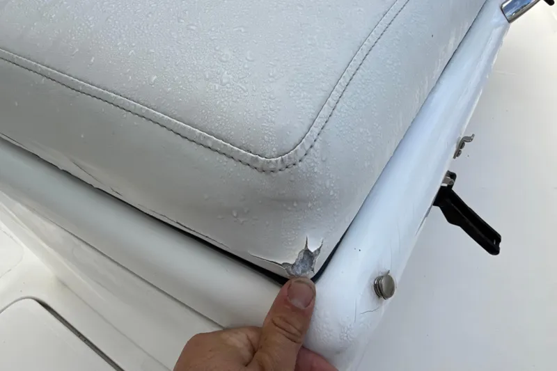 Slide: The Image of Close-up of a damaged seat on a 2002 SeaCraft SC32 Master Angler boat. - 44