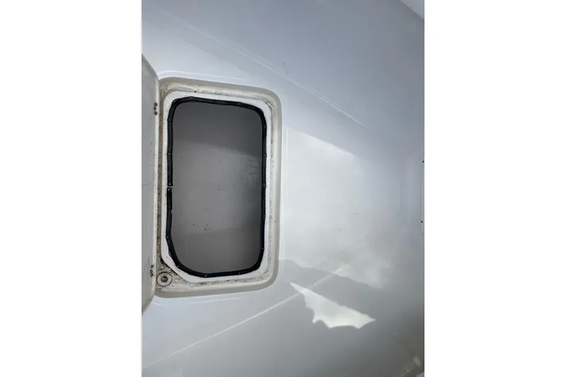 Slide: The Image of Open hatch on 2002 SeaCraft SC32 Master Angler boat deck. - 50