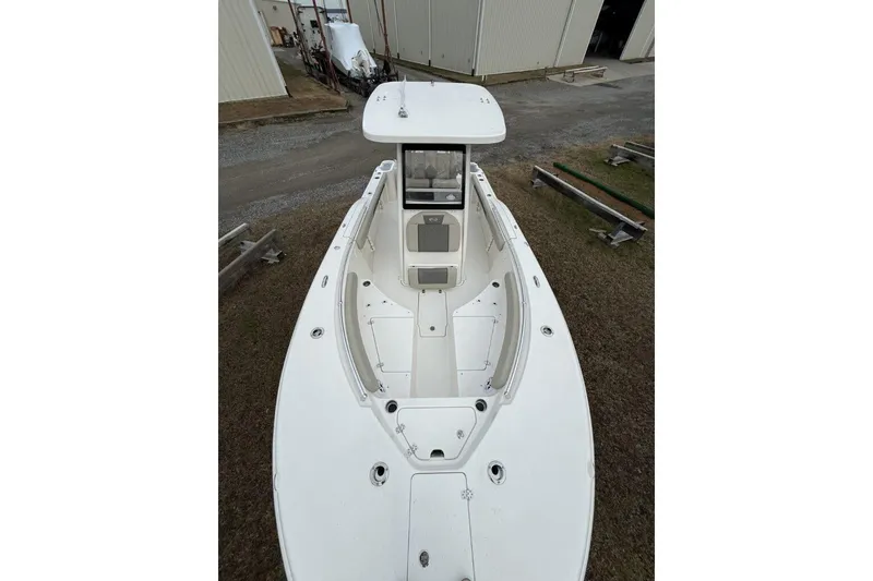 Slide: The Image of 2026 Key West 244 Center Console boat interior with open storage compartments. - 15