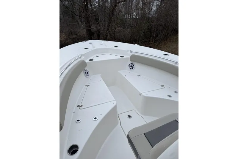 Slide: The Image of 2026 Key West 244 Center Console boat seat with Yamaha engines in background. - 9