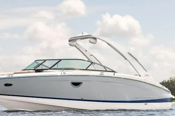 The Image of 2026 Regal LS6 boat on water under cloudy sky. - 0