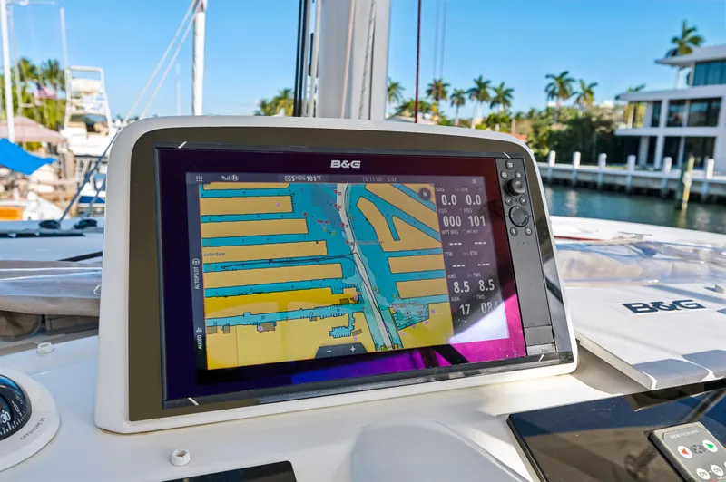 Slide: The Image of Navigation display on 2022 Lagoon 46 catamaran, showing marina map and data. - 37