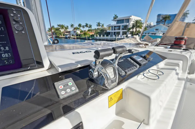 Slide: The Image of Control panel of 2022 Lagoon 46 catamaran with modern navigation equipment. - 39