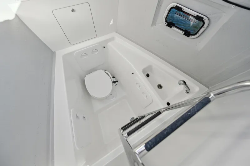 Slide: The Image of Modern bathroom interior of 2022 Lagoon 46 yacht, featuring toilet and compact design. - 43