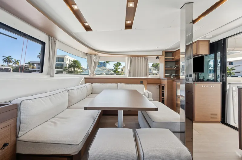 Slide: The Image of Luxurious interior of 2022 Lagoon 46 catamaran with spacious seating and modern design. - 48