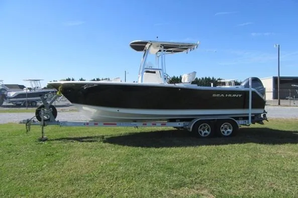 The Image of 2014 Sea Hunt Ultra 234 boat on trailer at Cedar Creek Marine Center. - 0