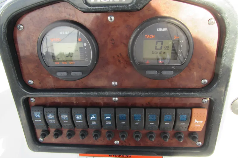 Slide: The Image of Dashboard of 2014 Sea Hunt Ultra 234 boat with Yamaha gauges and switches. - 21