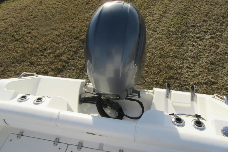 Slide: The Image of 2014 Sea Hunt Ultra 234 boat with outboard motor, viewed from above. - 33