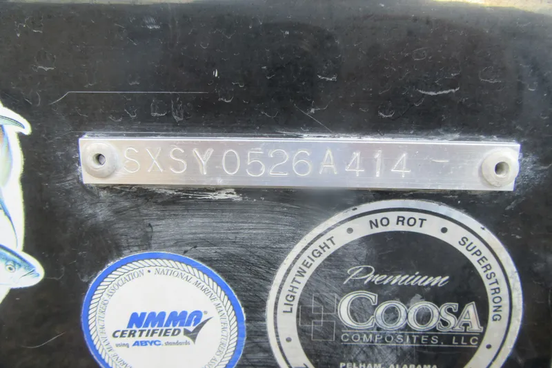 Slide: The Image of 2014 Sea Hunt Ultra 234 boat identification plate with certification stickers. - 6