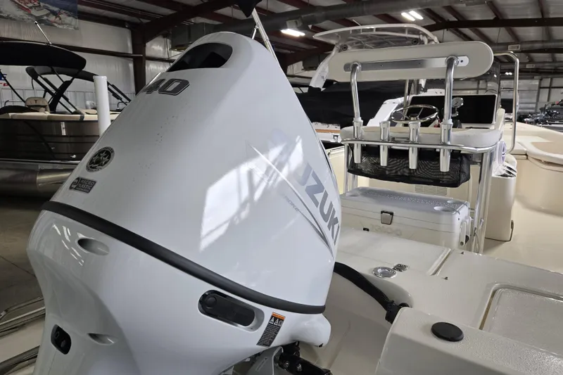 Slide: The Image of Bulls Bay 2000 boat with Suzuki outboard motor in a showroom, 2026 model. - 10