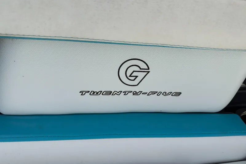 Slide: The Image of 2018 Nautique Super Air Nautique G25 Coastal Edition seat detail with logo and text. - 12