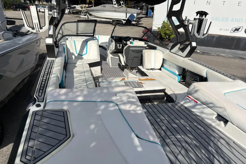 Slide: The Image of 2018 Nautique Super Air Nautique G25 Coastal Edition interior with sleek seating and modern design. - 15