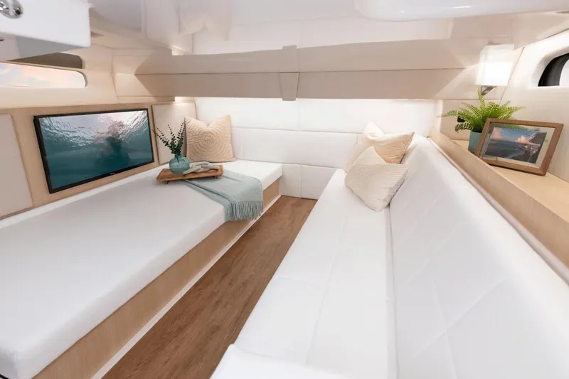 Slide: The Image of Manufacturer Provided Image: Luxurious interior of 2026 Regal 36 Grande Coupe with modern decor and comfortable seating. - 22