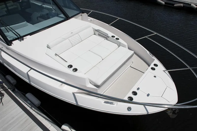 Slide: The Image of Manufacturer Provided Image: 2026 Regal 36 Grande Coupe boat with spacious white seating on deck. - 8