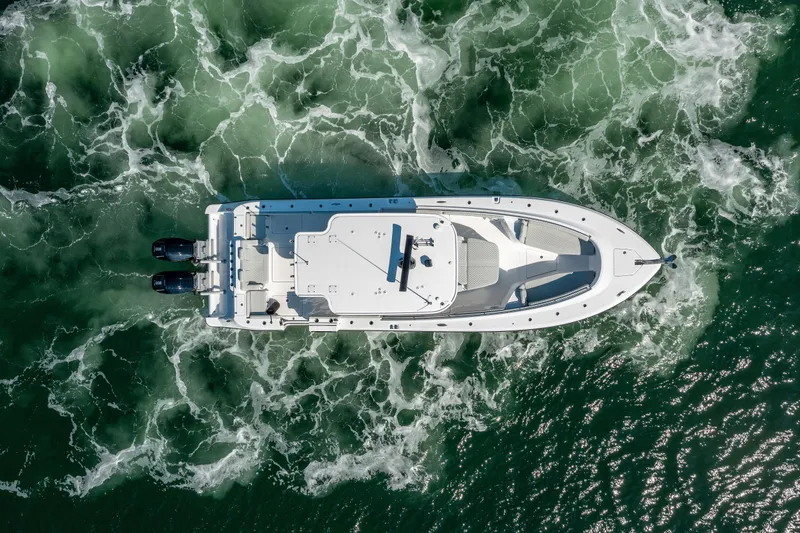 Slide: The Image of Aerial view of 2024 HCB 39 Speciale boat cruising on water. - 4