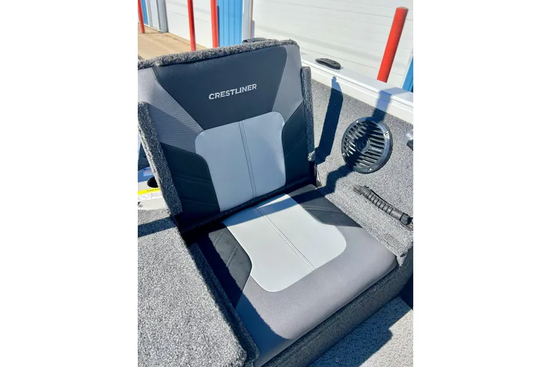Slide: The Image of 2024 Crestliner 1650 Fish Hawk SC boat seat with speaker, gray upholstery. - 15
