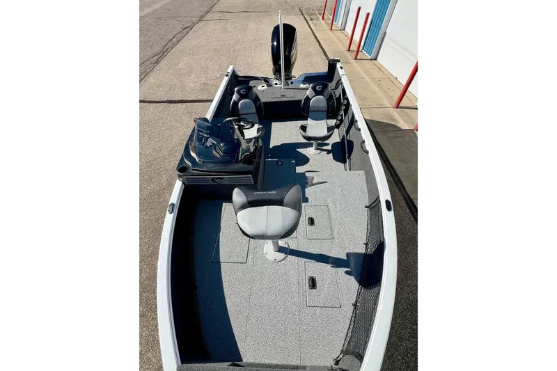 Slide: The Image of 2024 Crestliner 1650 Fish Hawk SC boat with spacious seating and modern design. - 26