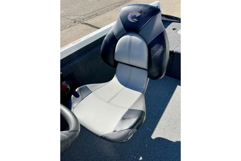 Slide: The Image of 2024 Crestliner 1650 Fish Hawk SC boat seat, black and gray design. - 28
