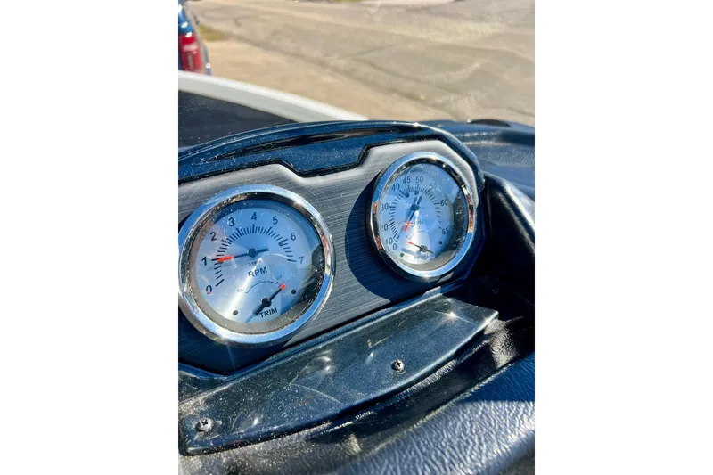 Slide: The Image of Dashboard gauges of 2024 Crestliner 1650 Fish Hawk SC boat, showing RPM and speed. - 31
