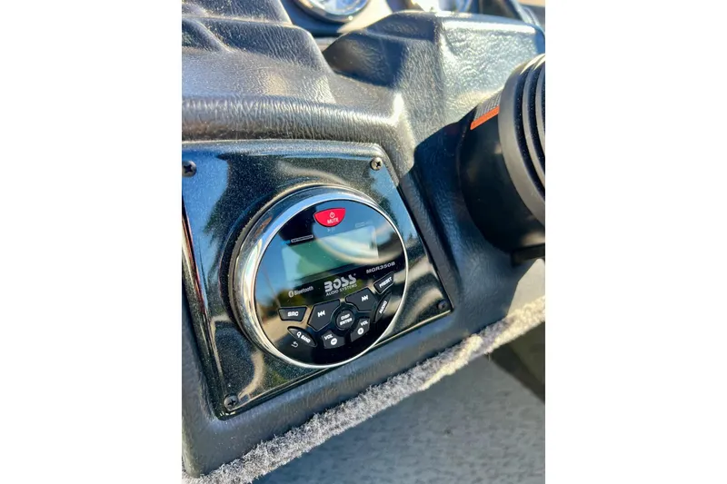 Slide: The Image of 2024 Crestliner 1650 Fish Hawk SC dashboard with Boss audio system. - 32