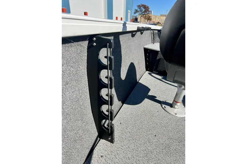 Slide: The Image of 2024 Crestliner 1650 Fish Hawk SC interior with rod holder and seating. - 54