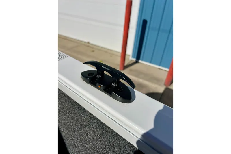 Slide: The Image of 2024 Crestliner 1650 Fish Hawk SC boat cleat detail in sunlight. - 57