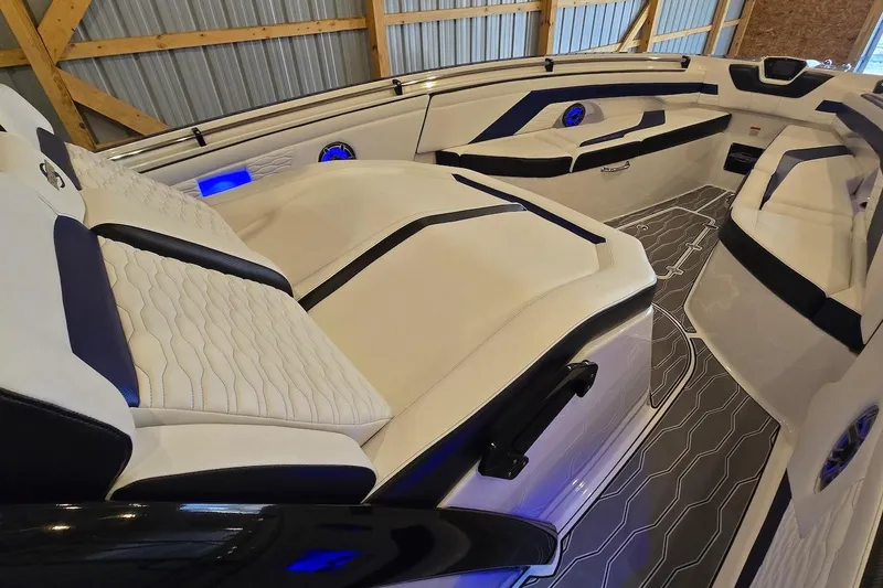 Slide: The Image of 2021 Sunsation 34 CCX boat interior with luxurious seating and modern design. - 14