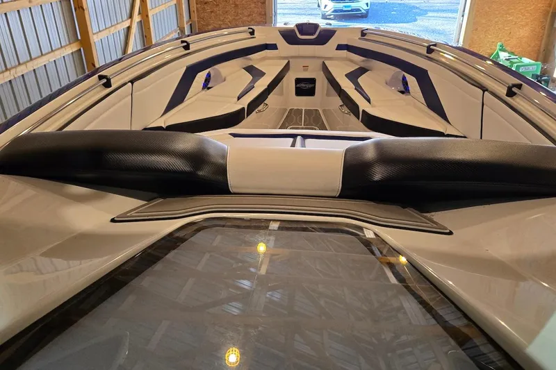 Slide: The Image of 2021 Sunsation 34 CCX boat interior with sleek seating and modern design. - 15