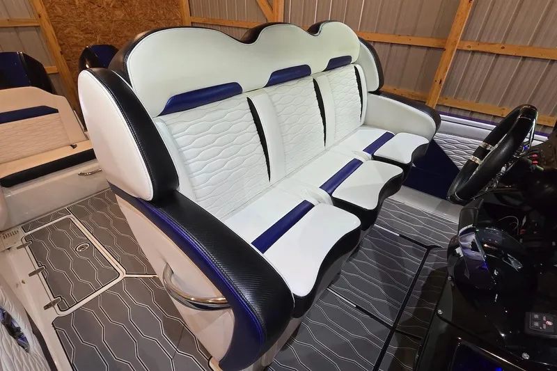 Slide: The Image of Luxurious interior seating of 2021 Sunsation 34 CCX boat with modern design and premium materials. - 19